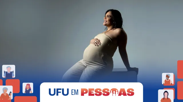 Mulher grávida num ensaio fotográfico de pré-natal